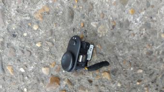 Knopje vd buitenspiegels Saab 95 uit 2004
