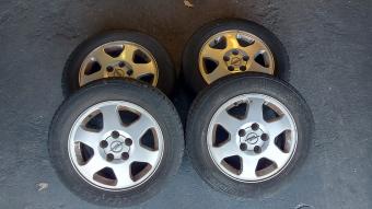 Originele 15 inch LM Opel Astra G velgen, goede banden