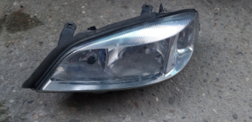 Linker koplamp Opel Astra G