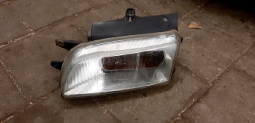 Linker koplamp Citroen Berlingo 1999