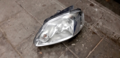 Linker koplamp VW  Fox 2004