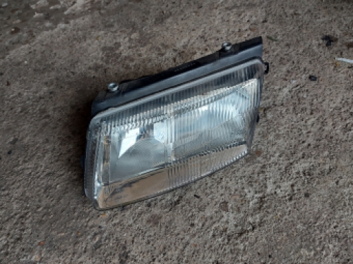 Linker koplamp VW Passat 1999