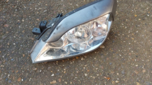 Linker koplamp Nissan Primera 2005