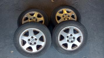 Originele 15 inch LM Opel Astra G velgen, goede banden