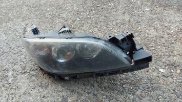 Rechter koplamp Mazda 3 uit 2004