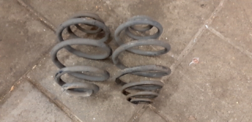 Set achterste spiraal veren Opel Corsa B