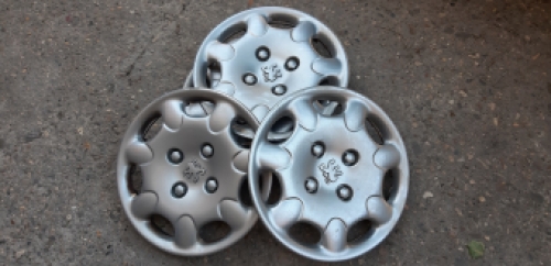 Set wieldoppen Peugeot 206 uit 2001